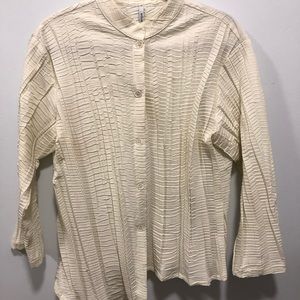 Asymmetric blouse by Blanque.